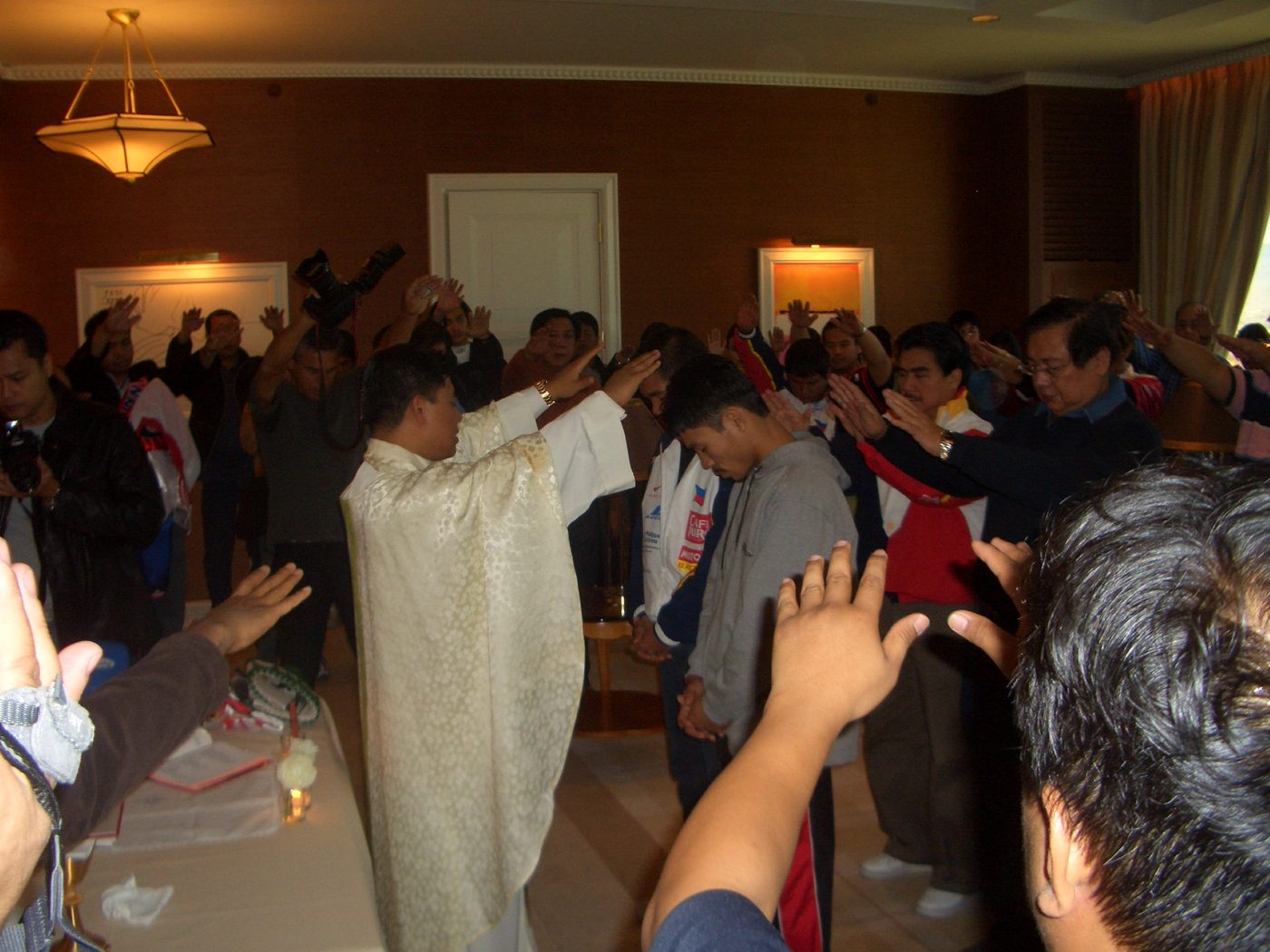 Manny Pacquiao praying in the ring before a fight.